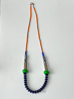 Load image into Gallery viewer, Modern Necklace with orange, green beads, and blue beaded strands on a white background. By Forme jewellery in Leeds
